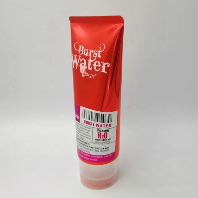 Cosmetic Tube With Disc Top Cap