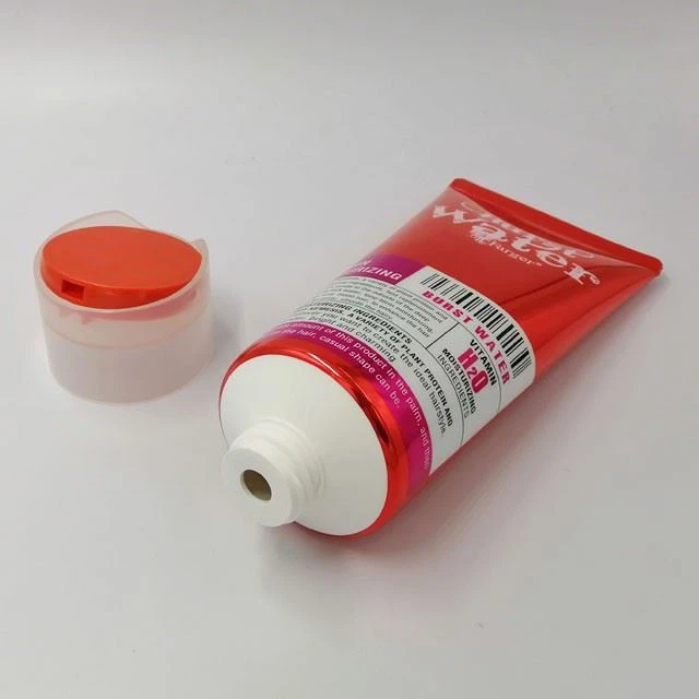 Cosmetic Tube With Disc Top Cap