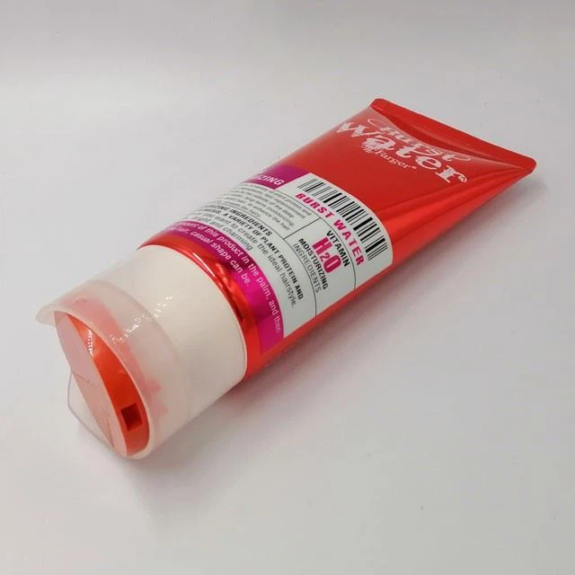 Cosmetic Tube With Disc Top Cap